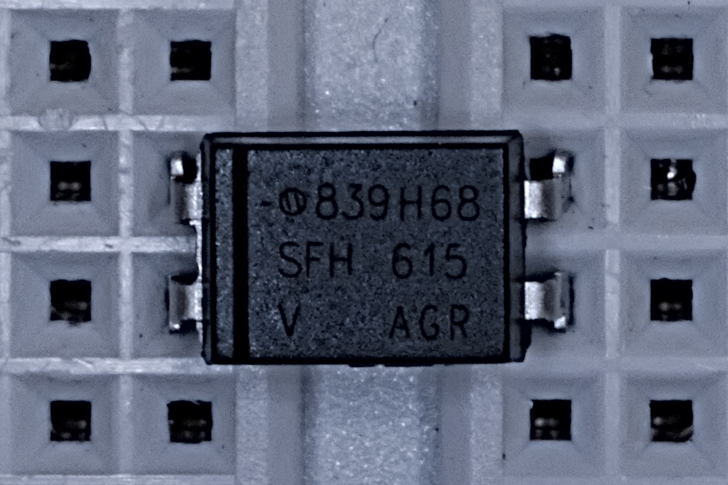 The optocoupler has a notch taken out of the left side of the DIP chip. The left pins (1 and 2) are to the LED and the right pins (3 and 4) are to the phototransistor.