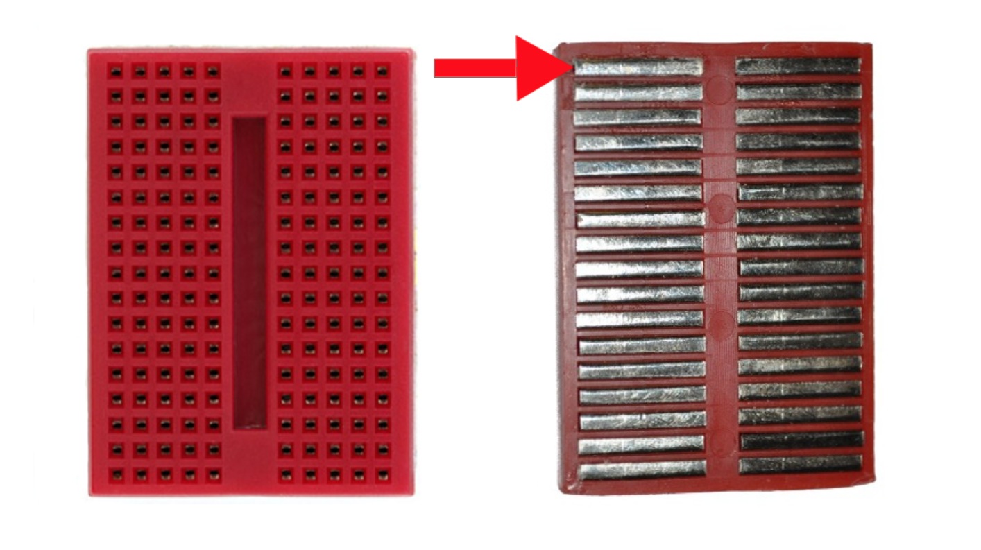 Breadboard with rows of holes shown from front and back, revealing internal metallic connection strips.