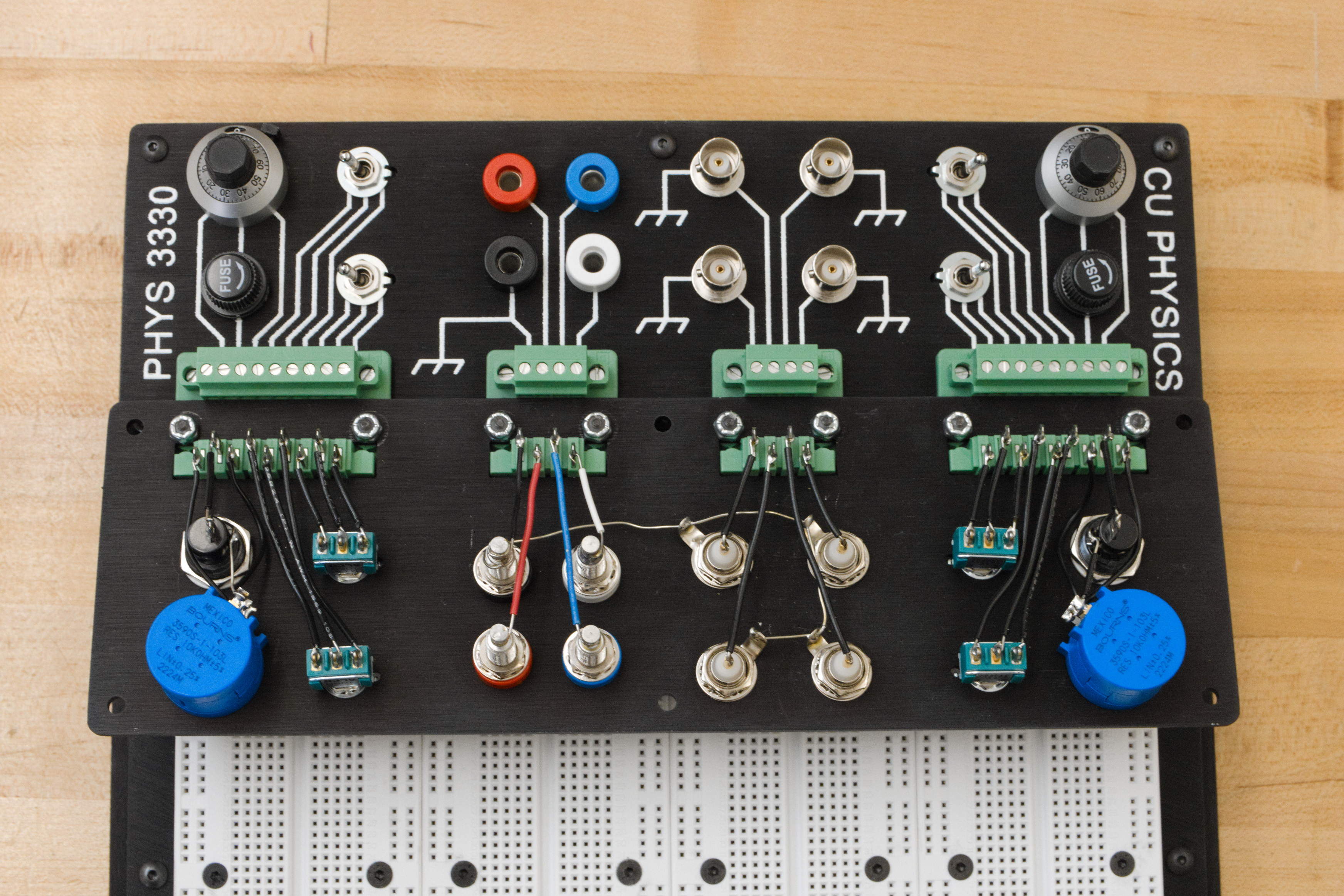 Figure 3: A breadboard with a header attached (a second header is shown upside-down to reveal what’s going on “under the hood”)